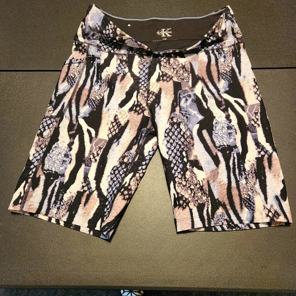 Calvin Klein Pants - Calvin Klein women's active shorts long. Animal print size large